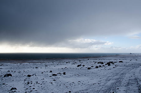 seashore under nimbus cloud thumbnail