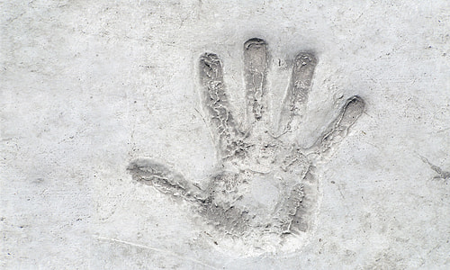 hand print on gray concrete surface thumbnail