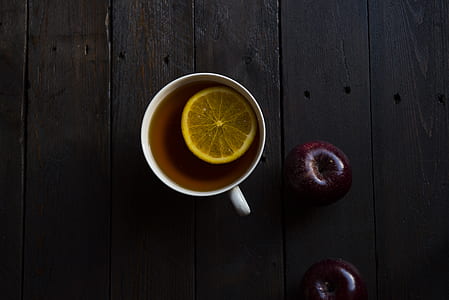 slice lemon on brown liquid thumbnail