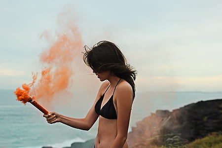 woman wearing black bikini top thumbnail