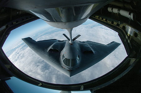 gray jetplane on clouds at daytime thumbnail