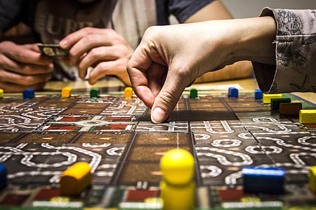 two persons playing gameboard thumbnail