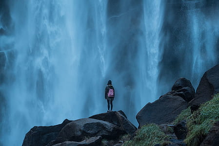 girl with pink bag watching waterfall digital wallpaper thumbnail