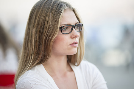 woman wearing eyeglass with black frames thumbnail