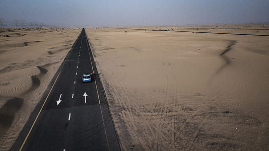 Blue Car On The Road thumbnail