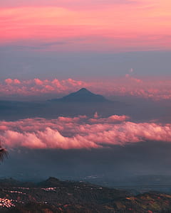 photo of mountain surrounded with clouds thumbnail