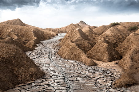 dried river surrounded with mountains thumbnail