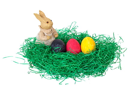 brown rabbit figurine and eggs in nest thumbnail