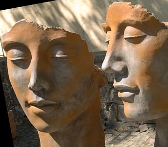 two sculpture of person statuette thumbnail