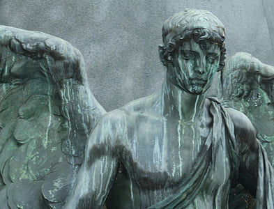 faded statue of male angel thumbnail