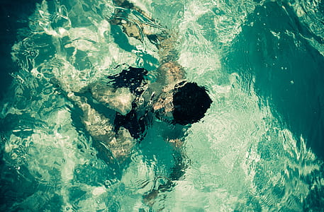 bird's eye view of man underwater thumbnail