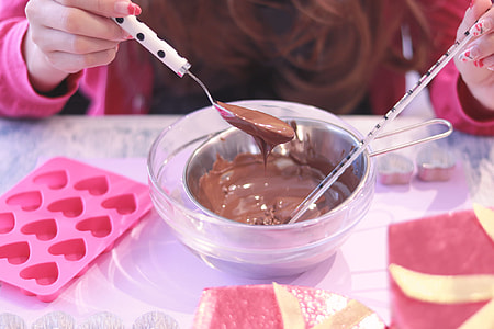 melted chocolate in stainless steel bowl thumbnail