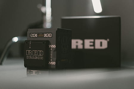 square black Red Dragon cordless electronic device with box thumbnail