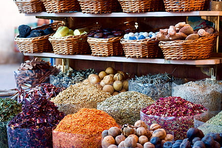 shelf full of baskets of vegetables thumbnail