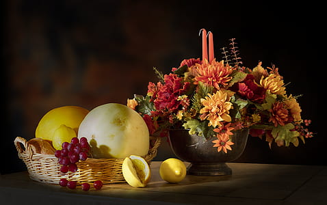 orange and red flowers centerpiece beside basket of fruits still life painting thumbnail