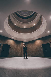 man smoking under dome interior thumbnail