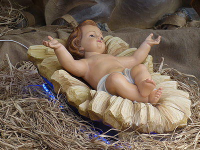 photography of baby Jesus ceramic figurine thumbnail