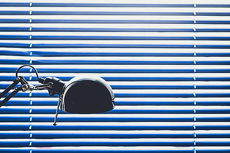 black corded lamp near opened window blinds thumbnail