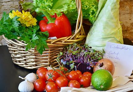 assorted-color fruits inside basket on black table thumbnail