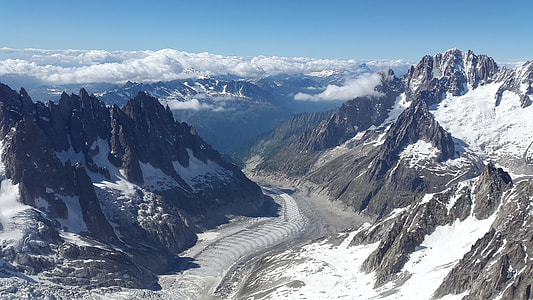mountains with snow during daytime thumbnail
