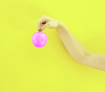 Person Holding Purple Apple Fruit thumbnail