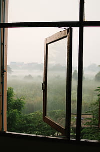 opened glass window with brown wooden frame thumbnail