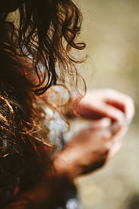 Woman in a dress with a camera thumbnail