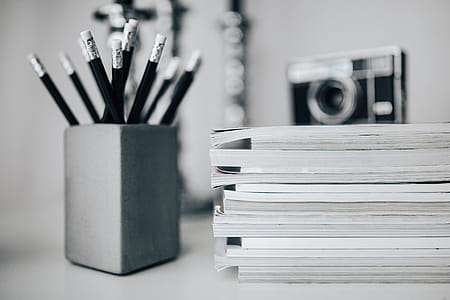Pencils, magazines and an old lightbulb thumbnail