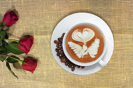 Cup of Coffee in Distance With Red Rose thumbnail