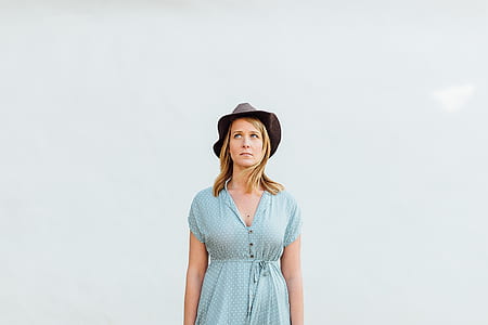 woman standing infront of wall thumbnail