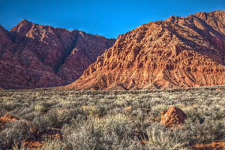 landscape photography of brown canyons thumbnail