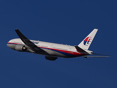 white, red, and blue airplane thumbnail