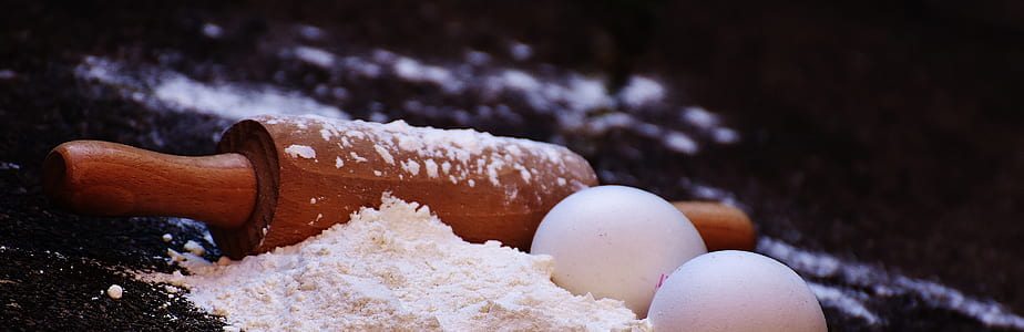 brown wooden rolling pin and eggs thumbnail
