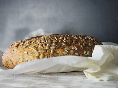 low light photography of baked pastry thumbnail