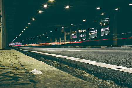 empty road during nighttime thumbnail