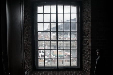 closed black wooden framed glass window thumbnail