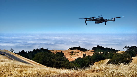black drone quadcoper flying on midair thumbnail