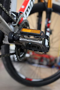 Close up detail of racing bicycle pedals on mountain bike. thumbnail