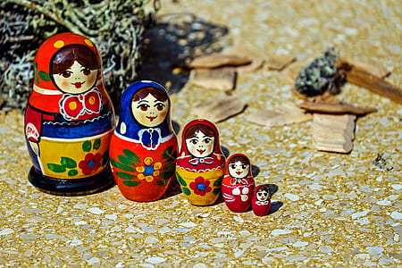 red, blue, and white floral matryoshka doll thumbnail