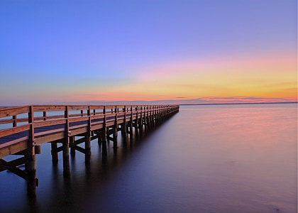 photo of bridge dock during golden hour thumbnail