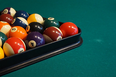 billiard balls on pool table thumbnail
