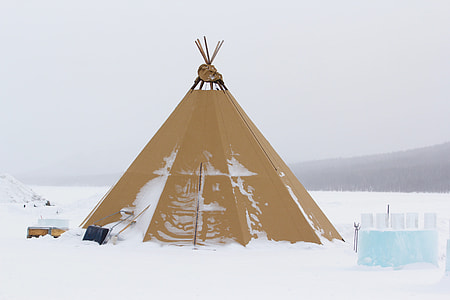 brown tent on snowfield thumbnail