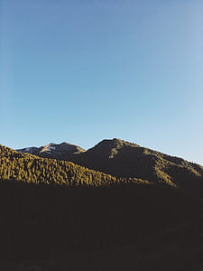 green mountains under blue sky during daytime thumbnail