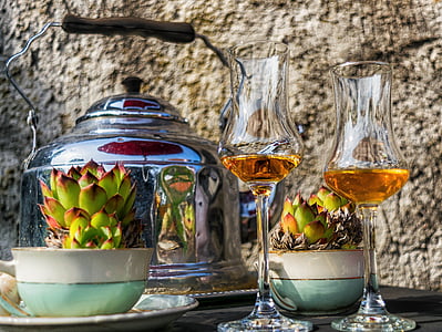 two clear wine glasses and silver kettle thumbnail