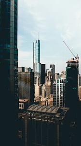 photo of high-rise buildings under sky thumbnail