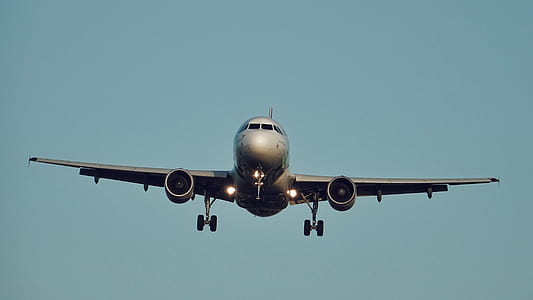 gray airplane in the air thumbnail