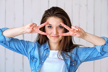 woman in blue denim button-up collared jacket thumbnail