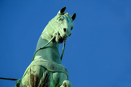 close-up photography of green horse statue thumbnail