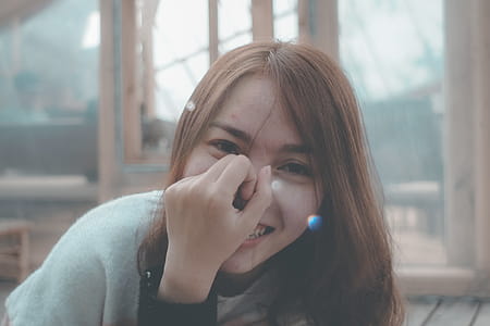 Smiling Woman in Gray Top thumbnail
