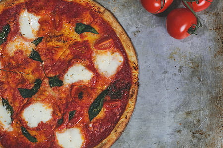 Margarita Pizza And Fresh Tomatos Photo thumbnail